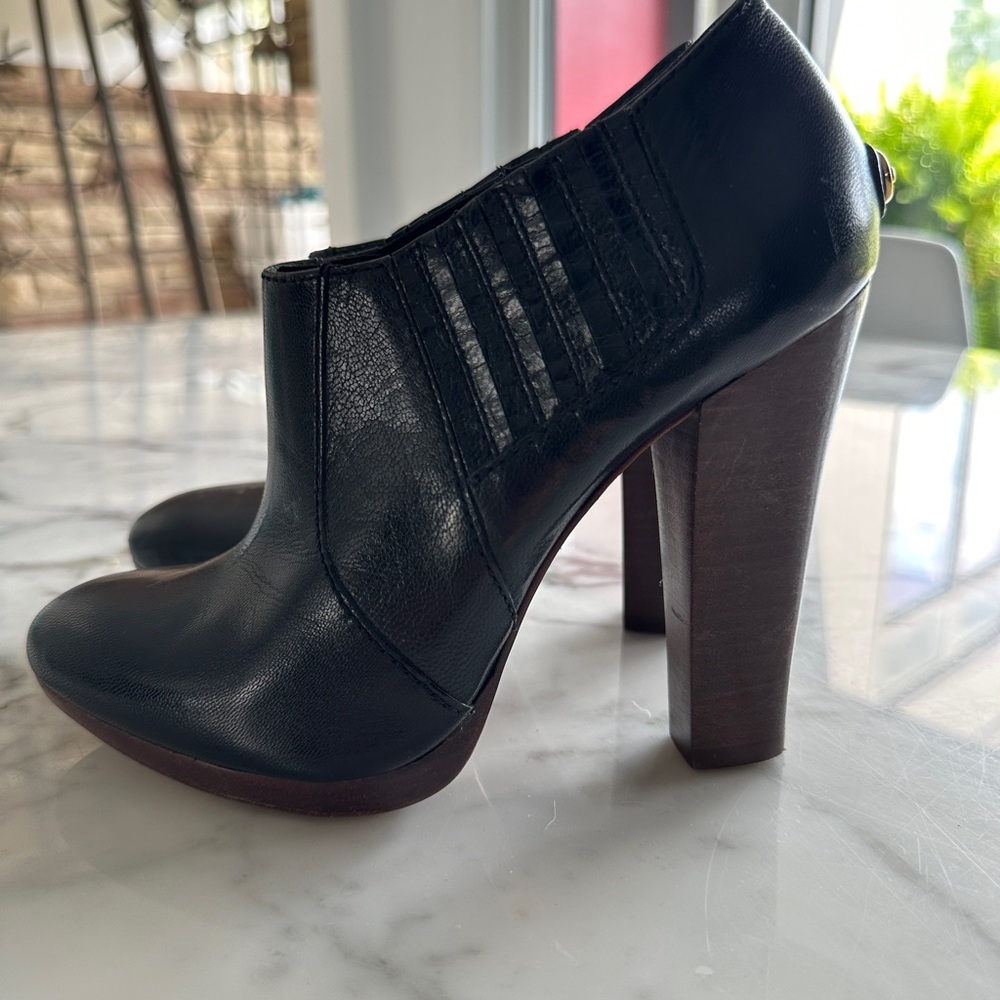 BCBG Black leather booties with wood heel. Size 6